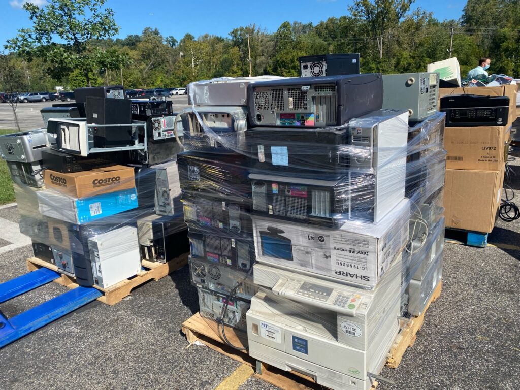 A pallet of desktop computers, tightly wrapped with shrink wrap, is ready for recycling at a recent MCPC e-recycling event.
